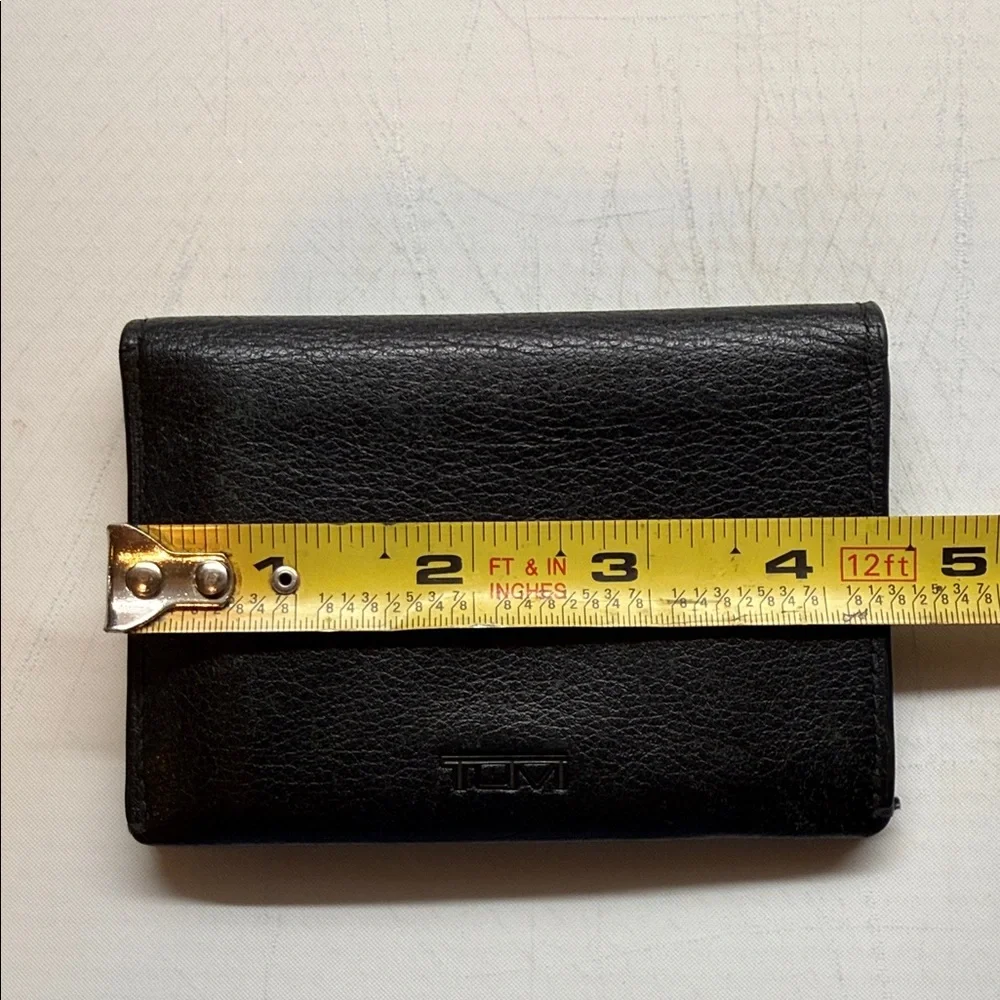 Tumi Black Leather Bifold Wallet with Branded Drawstring Pouch